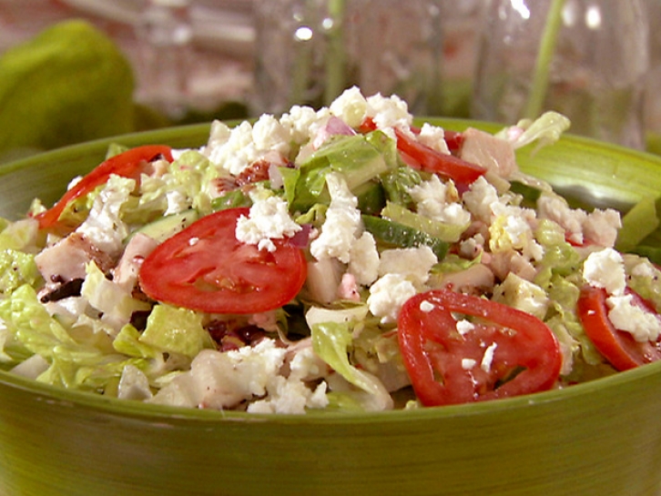Pasta primavera. Fresh bow-tie pasta with asparagus, beans, peas, snow-peas, tomatoes, carrots and peppers.